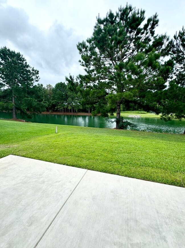 Building Photo - LOOK AT THIS ONE! BEAUTIFUL home with a pond view right outside the back patio!