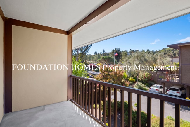 Building Photo - Bright & Tranquil End Unit!  A/C! Parking! Community Pool! FOUNDATION