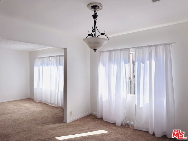 Building Photo - 6069 1/2 Cashio St