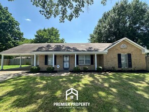Building Photo - Gorgeous 4BR/2BA Bartlett Home with Brick Fireplace & Spacious Fenced Yard!