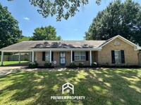 Building Photo - Gorgeous 4BR/2BA Bartlett Home with Brick Fireplace & Spacious Fenced Yard!