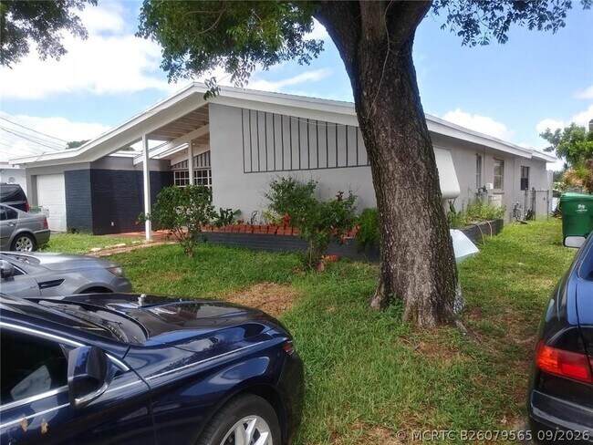 Building Photo - 6765 Rose Dr