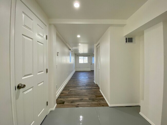 Building Photo - Remodeled 3BR, 2BA with Orchard, Garage & ...