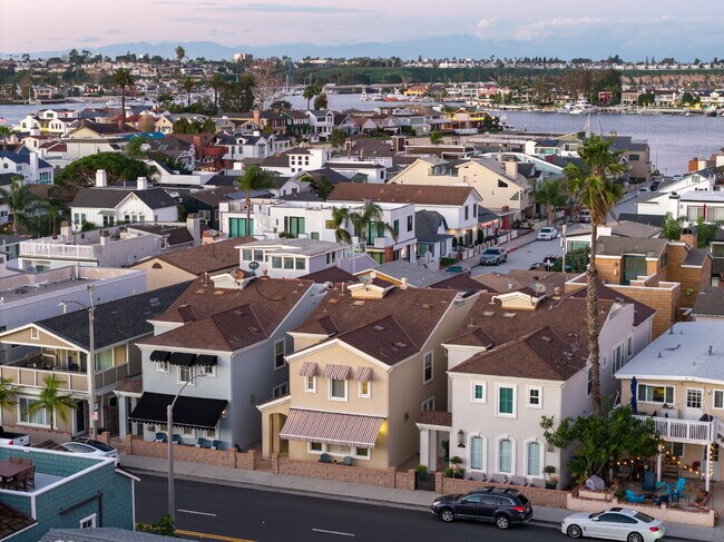 Building Photo - "Coastal Tommy Bahama at 208 East Balboa: Fully Furnished 3-Bed Sanctuary with Rooftop Deck