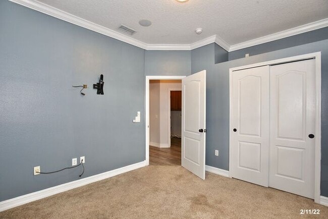 Building Photo - Luxurious 4/3 Waterfront Home with an In-ground Spa, an In-law Suite and a 2 Car Garage in the Hi...