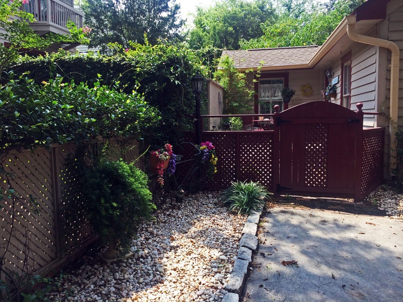 View of gated courtyard (taken from driveway) - 541 E Jones Ln