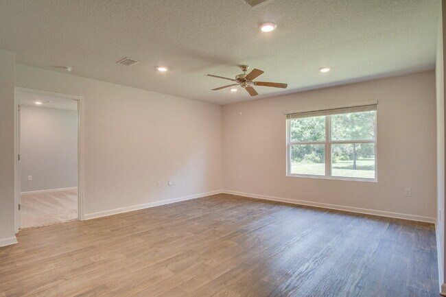 Building Photo - Spacious 4BD/2BA Brick Home Near Navy Federal