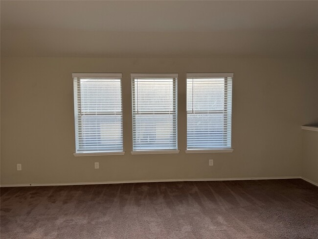 Building Photo - 8711 Windsong Trail Dr