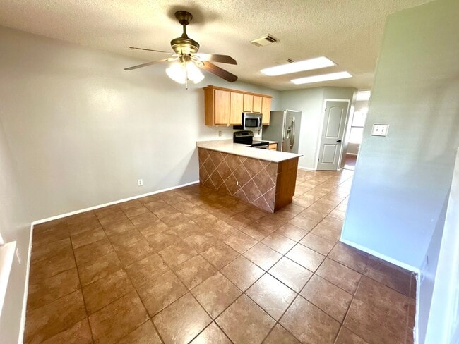 Building Photo - *MOVE IN SPECIAL* Energy-Efficient 4BR Home w/ Solar Panels, Loft & Backyard Oasis!
