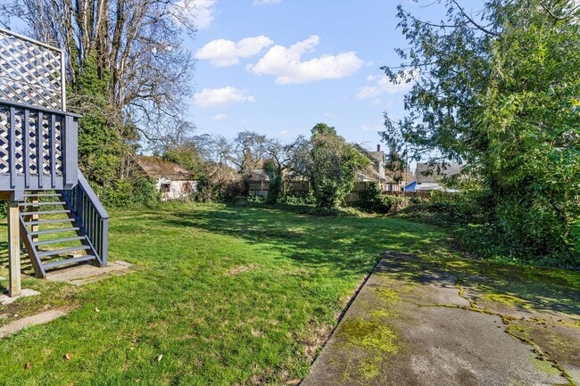 Building Photo - Spacious Tacoma Rental Featuring Large Yard & Entertainer’s Deck