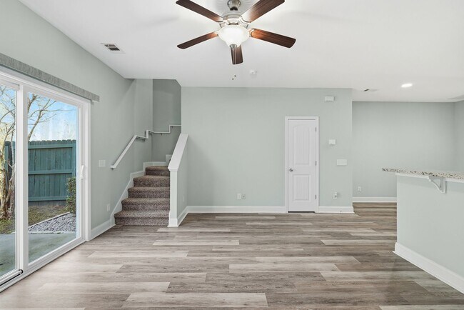 Building Photo - Charming 3 Bedroom Townhome with Private Patio & Fenced Backyard