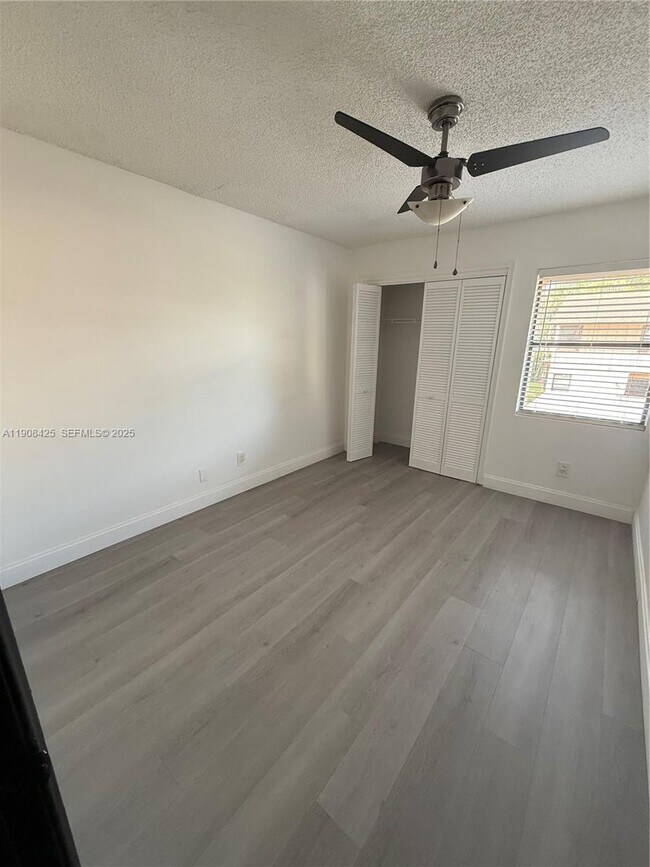 Building Photo - 9986 Royal Palm Blvd