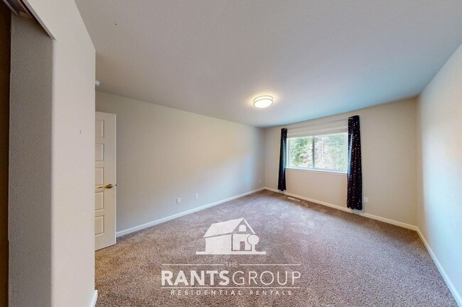 Building Photo - Luxury 4-Bedroom Home with 5-Car Garage & ...