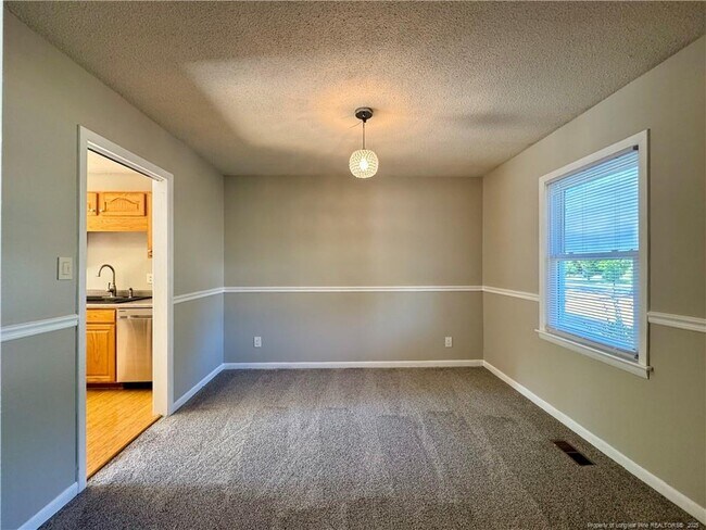 Building Photo - 5706 McDougal Dr