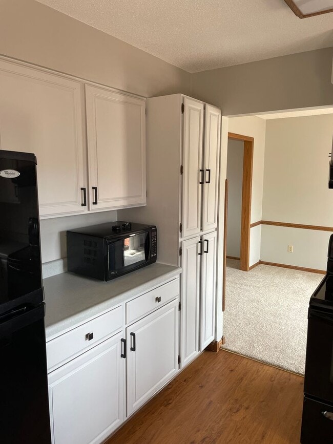 Building Photo - ~ FALL SPECIALS GALORE ~  Elegant 4-Bedroo...