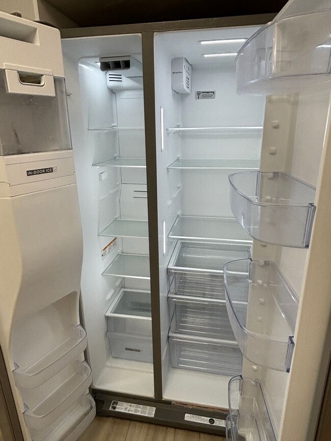 Building Photo - Charming Condo in a Can't-Miss Location – Private Deck, Garage, and Nature-Filled Community