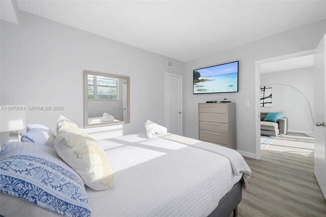 Building Photo - 19370 Collins Ave