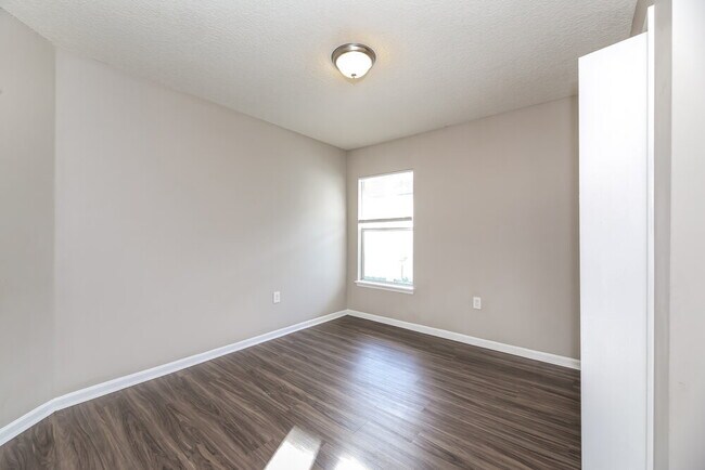 Building Photo - 7899 Cherry Blossom Dr N