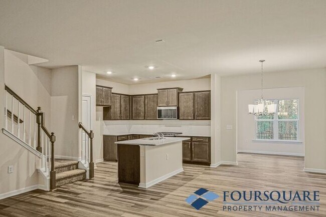 Building Photo - Spacious 3-Bed End- Unit Townhome with Mod...
