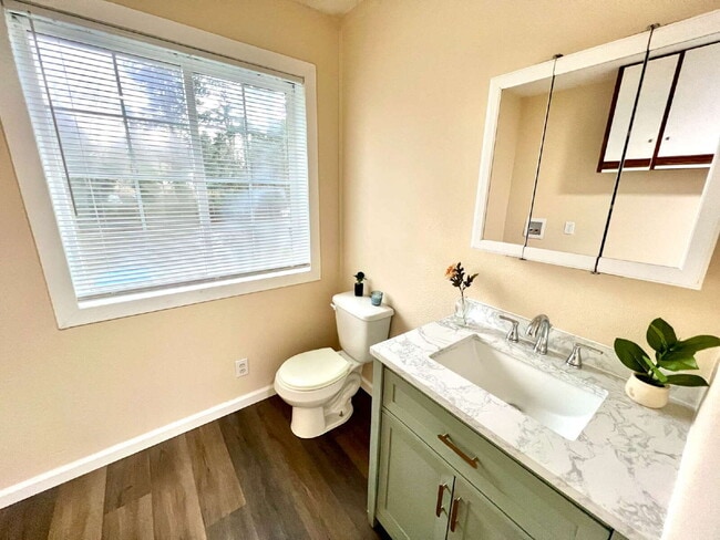 Building Photo - Elevated 3-Bedroom Home with Secure Garage & Cozy Living Space