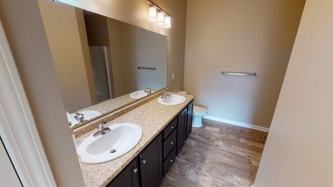 Building Photo - 3-Bedroom Ground-Level Unit with Rear View in Gated Community – Stair Access Required