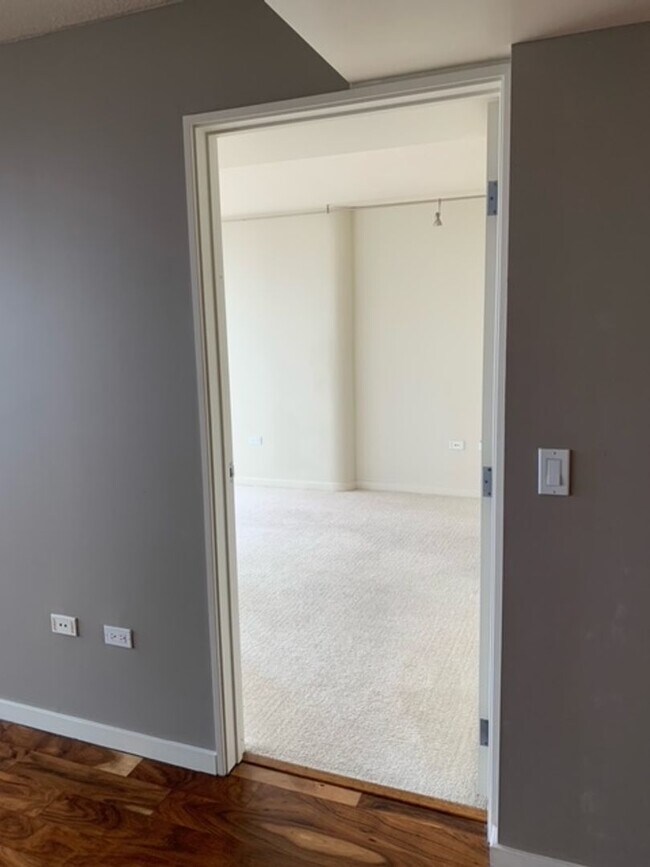 Building Photo - Moana Pacific - 2 bedroom plus den, 2 bath Condo with 2 parking - avail now!