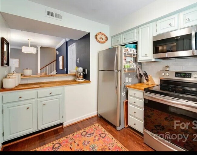 Cabinets are now a richer, deep green color - 3432 Colony Crossing Dr