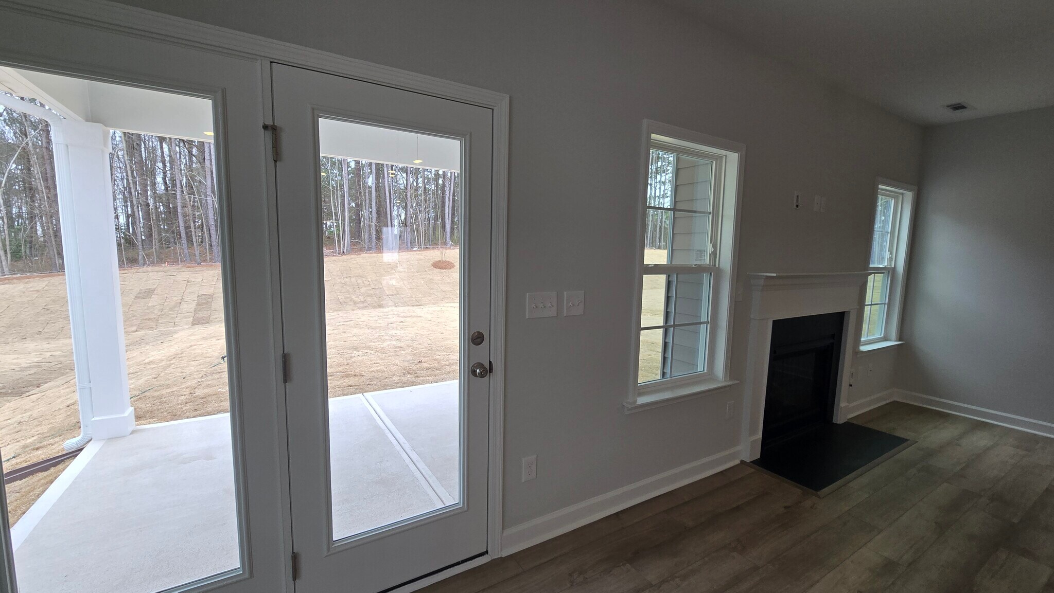 Door to backyard with a porch - 55 Paper Birch Trl