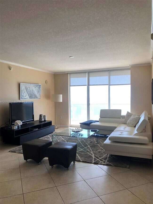 Building Photo - 16699 Collins Ave