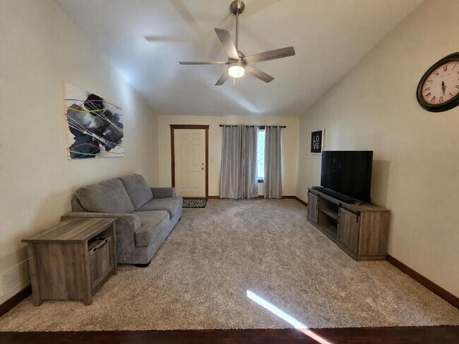 Building Photo - FREE SEPTEMBER RENT for this Spacious 4-Bedroom Home with Vaulted Ceilings with Finished Basement...