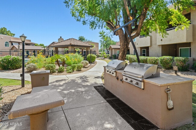 Building Photo - 9450 E Becker Ln