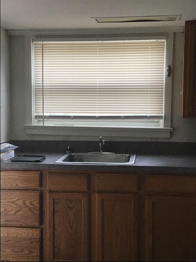 Building Photo - 9317 Monmouth Ave