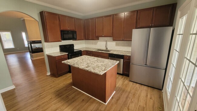 Building Photo - Spacious Three-Level Townhome with Finished Basement in Convenient Garner Location