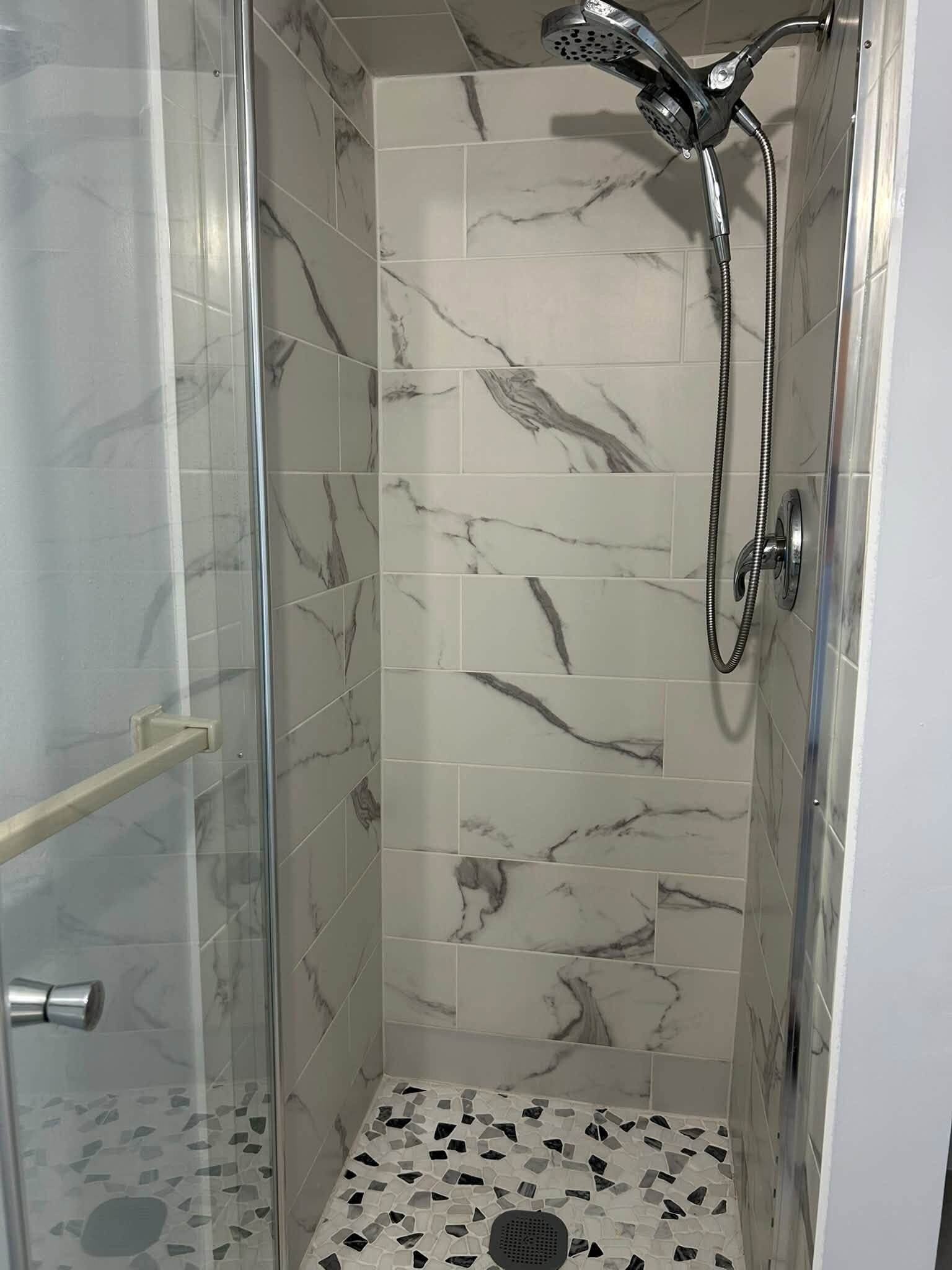 This luxury shower was installed less than a year ago. I had been wanting that for so long! - 7669 SE James St