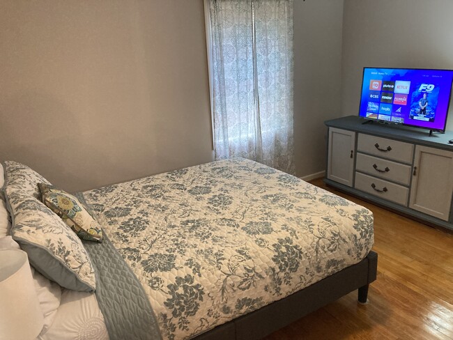 master bedroom with smart ROKU TV - 3132 Oak Cir