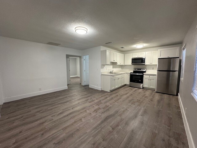 Building Photo - 18 Ave. Villas LLC