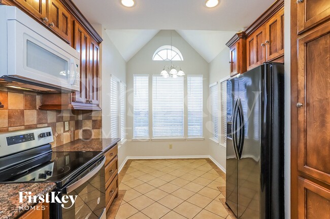 Building Photo - 6713 Queensclub Dr