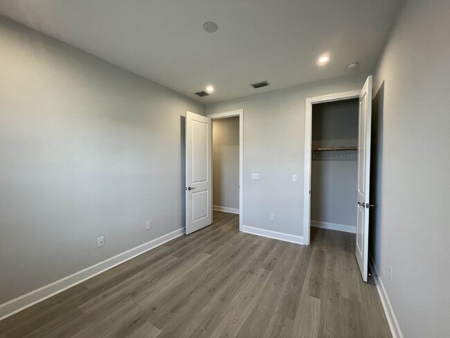 Building Photo - Gated Community 3 Bedroom with Den Villa A...