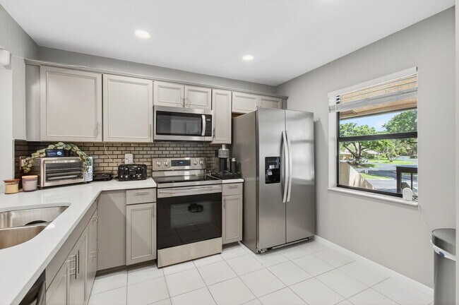 Building Photo - 8364 Boca Glades Blvd E