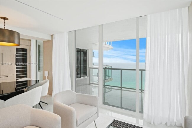 Building Photo - 18671 Collins Ave