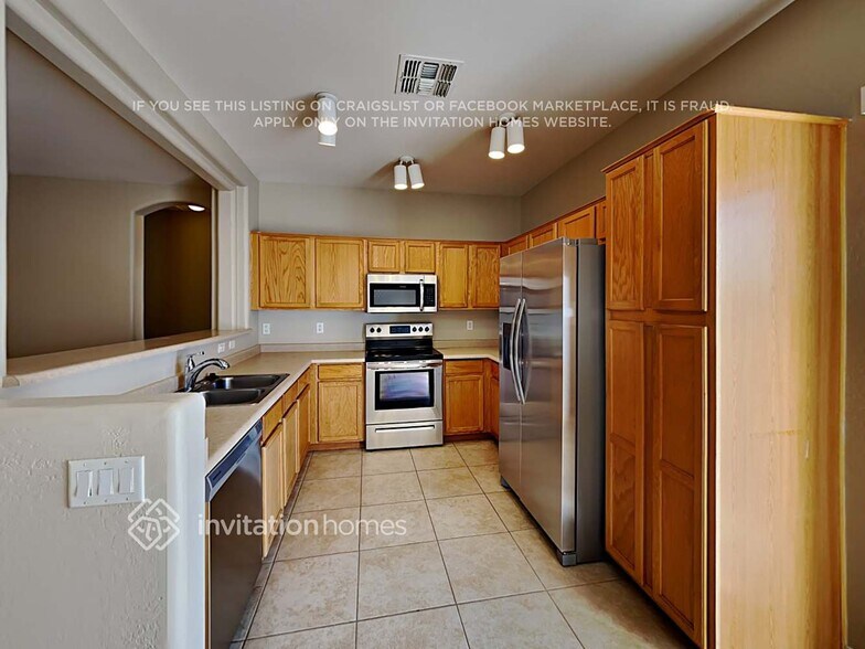 Building Photo - 15439 W Port Au Prince Ln