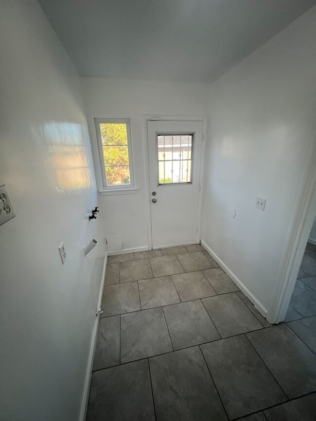 Building Photo - Spacious 2-Bedroom Home with Private Yard,...