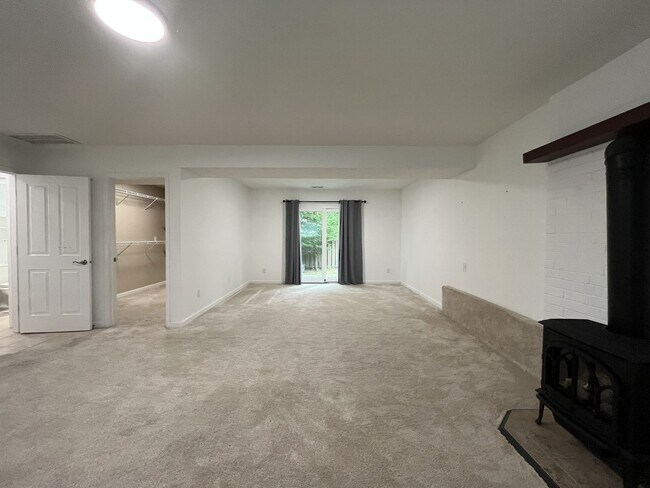 Building Photo - Three-Bedroom Home Near Nike Campus with Bonus Room, Large Deck & Two-Car Garage