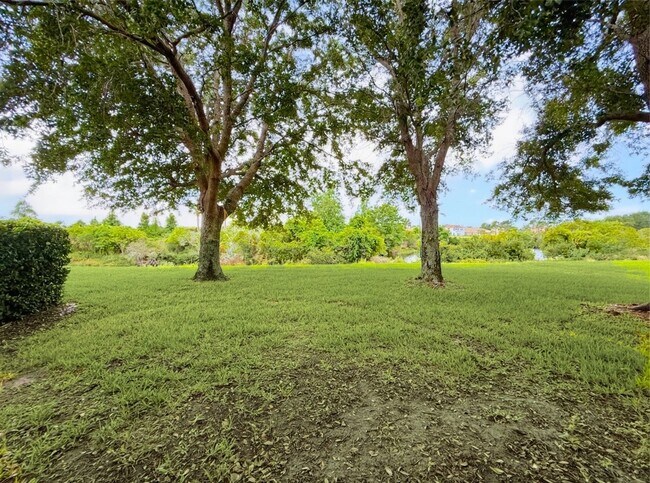 Building Photo - Waterfront 4 Bedroom Home in Eagle Creek Golf Community – Lake Nona