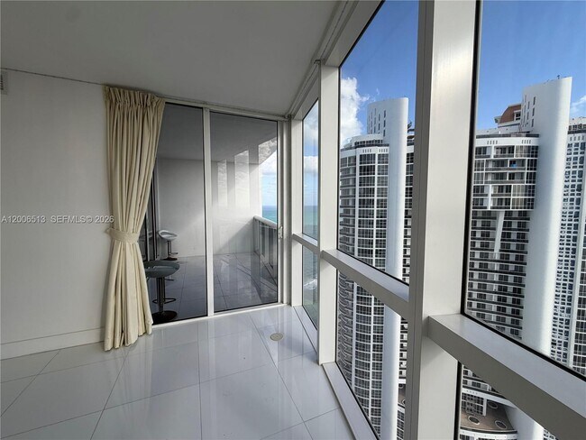 Building Photo - 18201 Collins Ave