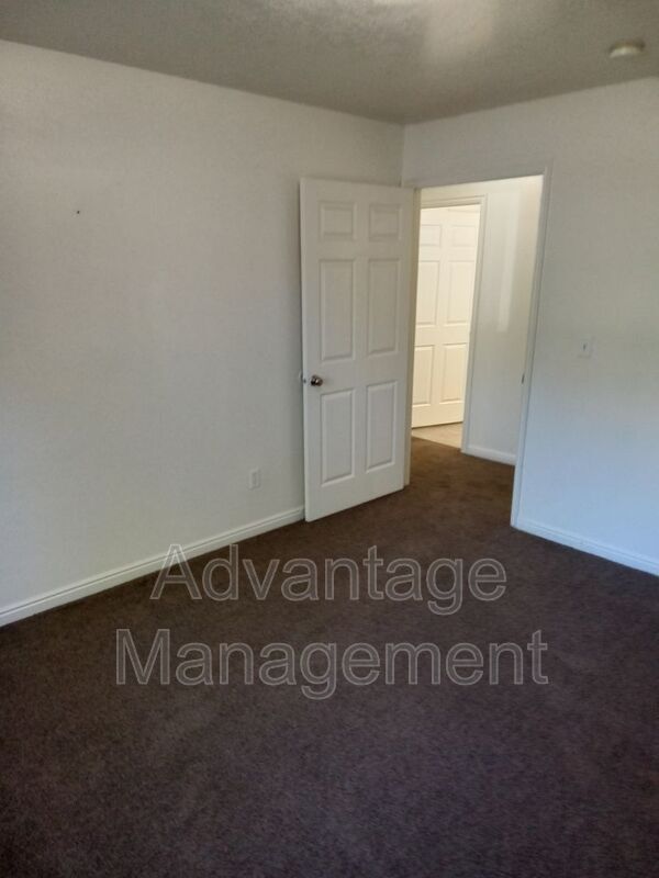 Building Photo - 8083 N Ridge Loop E
