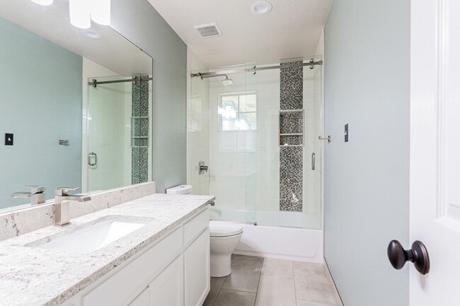 Building Photo - Gorgeous 4BR 2.5/BA Home with White Kitchen & Tree-Filled Yard