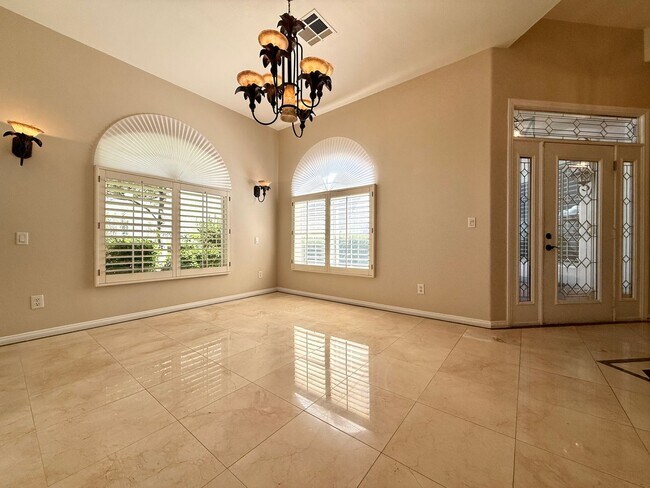 Building Photo - Grand 3 bedroom home with lake and golf course views located in Resort Villas ready to be your pa...