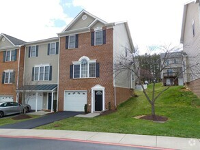 Building Photo - Stunning three story townhome with Garage ...