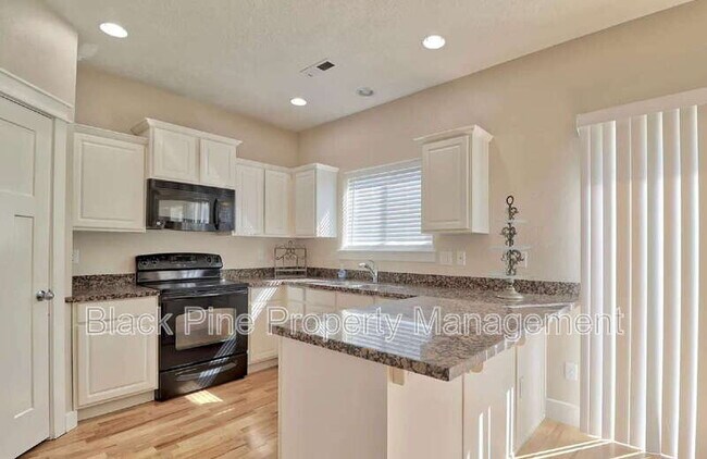Building Photo - 9773 W Bigwood Dr.